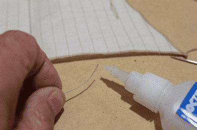 Sådan binder du revlehuller og knuder på modelskibssejl 3