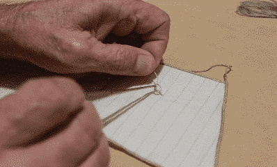 Sådan binder du revlehuller og knuder på modelskibssejl 6